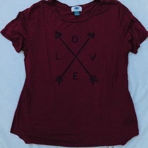 Maroon shirt.